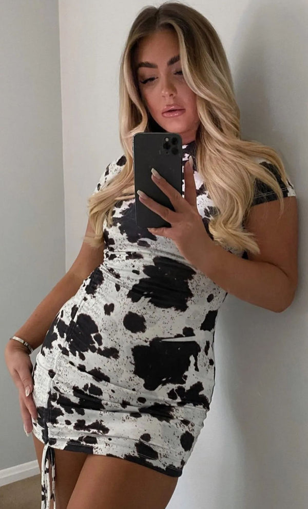 Tindra - Cow Print Mini Dress